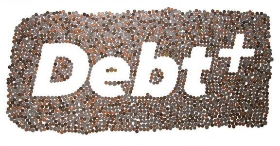 A collection of coins are gathered together. In the center, the negative space is used to spell out the word, "Debt +".